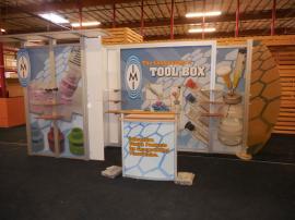 Modified VK-2926 Visionary Designs Hybrid Exhibit with LTK-1109 Curved Counter with Locking Storage -- Image 1