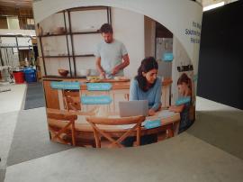 RENTAL: Gravitee One-Step System Custom Island with Storage Closet with Locking Door, Sintra and Frosted Acrylic Insert Panels, Custom Curved Shelving Unit, RE-1211 Counter/Bar, and Silicone Edge Fabric Graphics