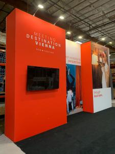RENTAL: Custom Gravitee System Backwall at 20 Ft Wide x 12 Ft High with Large Monitor Mount, 55" Monitor, (6) LED Arm Lights, and SEG Fabric Graphics