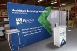 Symphony Portable Display with SEG Fabric Graphic, Monitor Mount, and SYM-406 Portable Counter with Locking Storage -- View 2