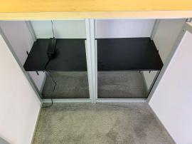 RENTAL: Inline Design with Single-Sided Lightbox, Large White Laminated Planter Box, and (2) Small Planter Boxes, RE-1567 Backlit Reception Counter with Hard Rock Maple Top, Custom Slatted Wood, Large Monitor Mount, 65" Monitor, and SEG Fabric Graphics --