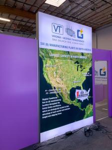 RENTAL: Island Design with Gravitee Storage Closet with Locking Door, Conference Room with Lightboxes, Large Custom Counter with Lightbox, Free Standing Lightboxes, (2) RE-704 Charging Station Tables, (2) Large Monitor Mounts, 55 Inch Monitor, 75 Inch Mon