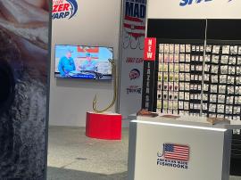 RENTAL: Island Rental Design with (3) 10' Wide x 12' High Double-Sided Gravitee System Kiosks with Black Slatwall on Both Sides -- View 4