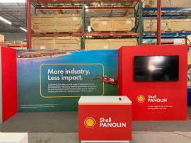 RENTAL: RE-2054 Gravitee Panel System Inline Design with Storage Closet with Locking Door, Large Monitor Mount with Internal Extrusion Supports, 65" Monitor with HDMI Cable, RE-1576 White Laminated Reception Counter with Recessed LED/RGB Lighting, SEG Fab