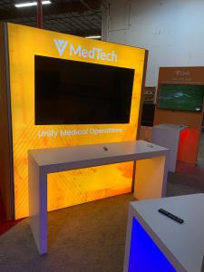 RENTAL: Modified RE-9191 Island Design with Gravitee Storage Closet @ 80" Wide x 42" Deep x 95" High with Locking Door, and (2) Single-Sided Lightboxes @ 76" Wide x 95" High, (3) 4 ft. Wide x 8 ft. High Single-Sided Lightboxes, (3) White Laminated Waterfa