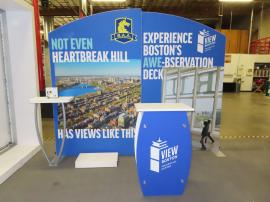 SYK-1046 Symphony Portable Display with Workstation, Monitor Mount, SEG Tension Fabric Graphic, LED Stem Lights, and SYM-408 Portable Counter with Locking Storage