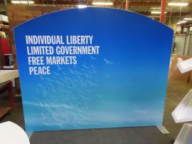 Modified VK-1362 Modular Exhibit with Tension Fabric Graphics, (3) Slanted Shelves, Backlighting, and SYM-406 Portable Counter with Locking Storage -- View 3