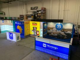 RENTAL: Inline Design with Gravitee Storage Closet, (1) 74" Wide x 95" High Lightbox, (2) 72" Wide x 95" High Lightboxes, (1) 48" Wide x 95" High Lightbox, Large and Small L-Shaped Gravitee Shelving Areas with LED Lit Laminated Shelves, Short Divider Wall