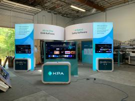 RENTAL: Island Design with Gravitee Storage Closet with Locking Door, (3) 60" Wide x 144" High Double-Sided Lightboxes with Baseplates, (2) Gravitee Curved Bridged Headers, (9) Large Monitor Mounts, (1) 85" Monitor, (1) 65" Monitor, (7) 55" Monitors, Whit