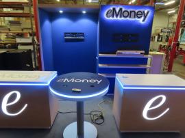 Modified GK-2990 Modular Inline with Halo Logo, (2) Monitor Mounts, (3) Shelves, (1) Closet Door, (2) Modified MOD-1596 Custom Counters with Programmable RGB LED Lights, and (1) MOD-1453 Bistro Charging Table -- View 3