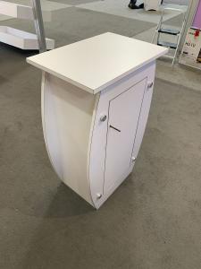 RENTAL: RE-1094 Inline Design with Symphony Large Concave Curved Extrusion Frame, SYM-401 Workstation Counter with Two Wireless Charging Ports, SYM-402 Workstation Counter, Monitor Mount, 32" Monitor, RE-1255 Reception Counter, (2) LED Arm Lights, SEG Fab