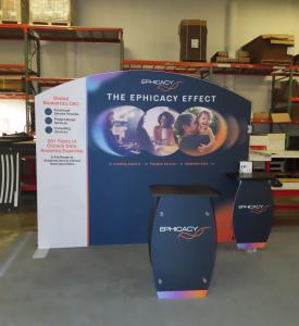 SYK-1010 Symphony Portable Display with SEG Tension Fabric Graphic, Backwall Workstaion Counters, Wireless Charging Pads, Direct Print Graphics, SYM-408 Counter with Locking Storage, and (2) LED Stem Lights -- View 2