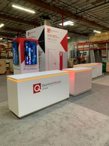 RENTAL: Custom Island Design with RE-1710 Gravitee Storage Closet at 42" Wide x 42" Deep x 95" High with Locking Door, (4) 55&rdquo; Monitors, Gravitee Storage Tower at 96" Wide x 96" Deep x 142.5" High, with Locking Door, (2) RE-1600 White Laminated Counters