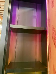 Custom Display Arch with Halo Lit Logo, RGB Programmable Lighting, Adjustable Shelves, and Product Displays -- View 6