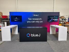 RENTAL: RE-2110 Inline Design with Single-Sided Lightbox @ 232" W x 96" H with Fabric Blocker Panel, (2) Large Monitor Mounts, (2) 55" Monitors with HDMI Cables, (2) RE-1579 White Laminated Genius Bars, RE-1207 Large Rectangular Reception Counter with Bla